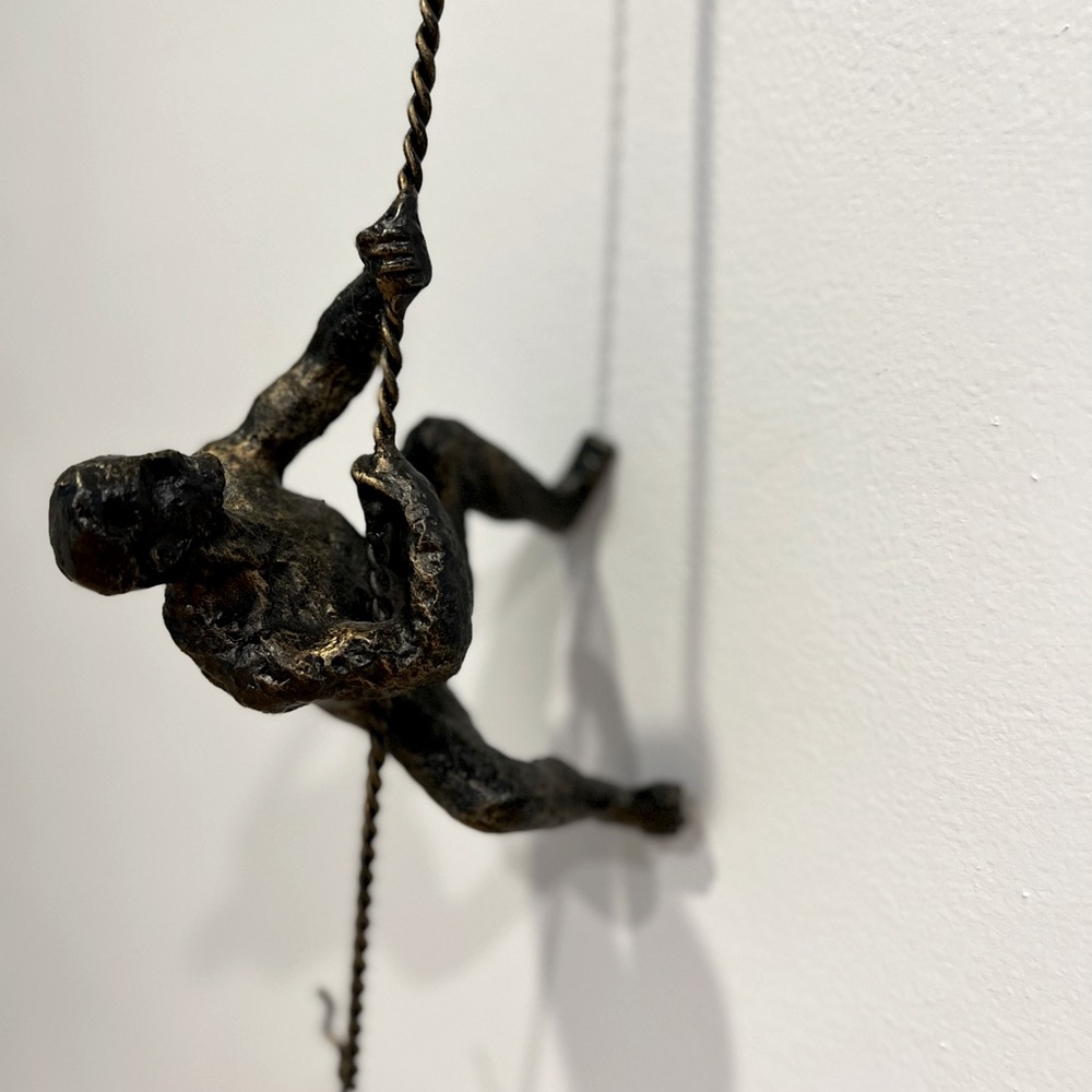 Global Views Climbing men wall art. Cast iron.
4.5"W x 6.3"D x 43"T. 5.75 lbs